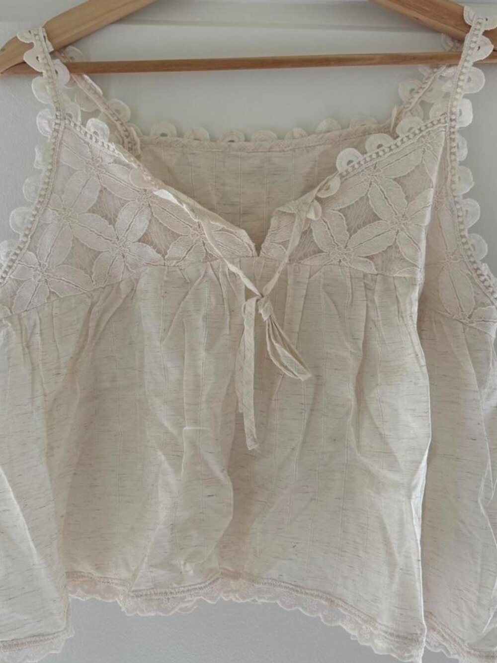 White lace tank top with floral embroidery and lace trim